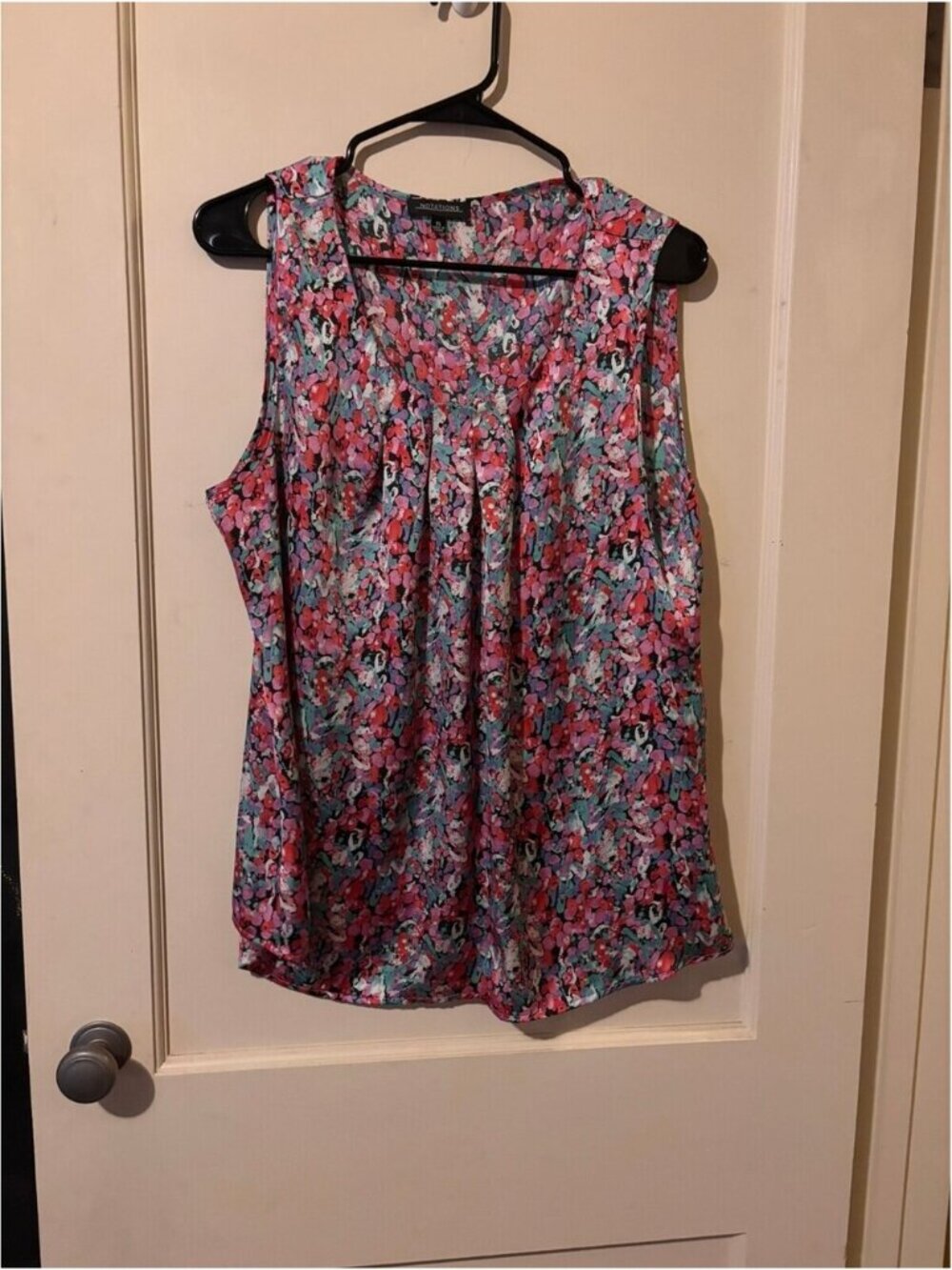 Notations floral sleeveless blouse